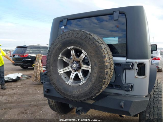 1C4BJWEG7EL121502 Jeep Wrangler Unlimited Sahara