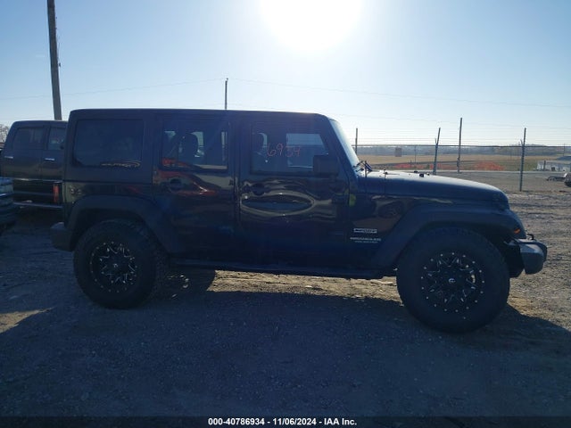 1C4BJWDG0EL314687 Jeep Wrangler Unlimited Sport
