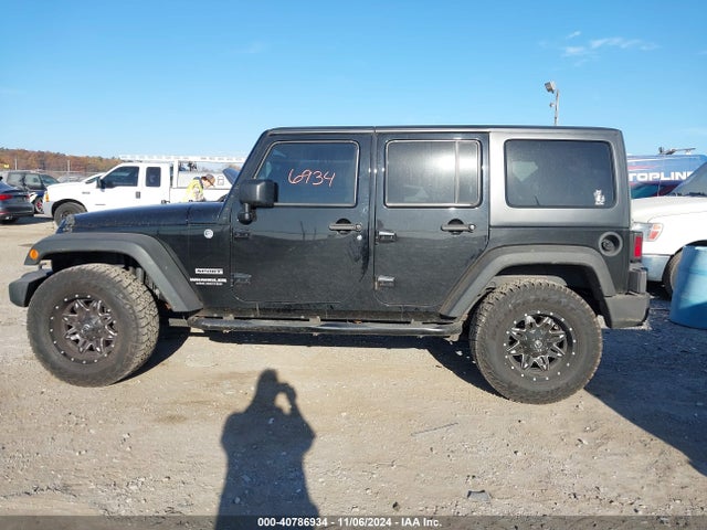 1C4BJWDG0EL314687 Jeep Wrangler Unlimited Sport