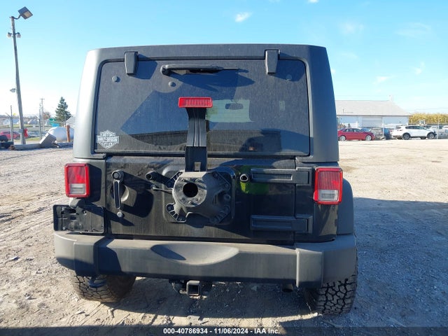 1C4BJWDG0EL314687 Jeep Wrangler Unlimited Sport