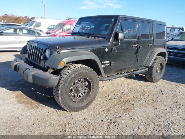 1C4BJWDG0EL314687 Jeep Wrangler Unlimited Sport