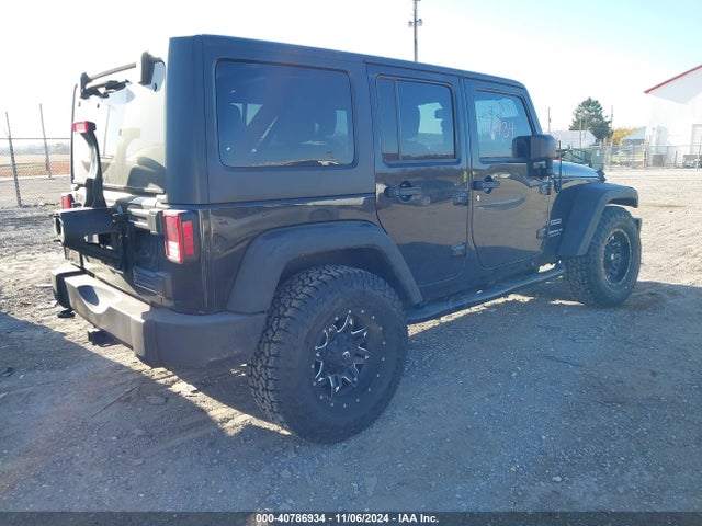 1C4BJWDG0EL314687 Jeep Wrangler Unlimited Sport