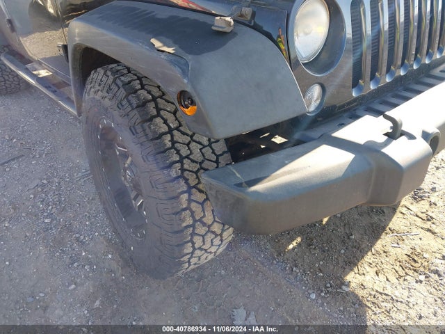 1C4BJWDG0EL314687 Jeep Wrangler Unlimited Sport