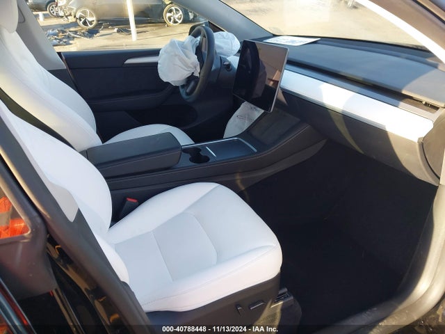 2023 TESLA MODEL Y 7SAYGDEE9PF787698 Photo 4