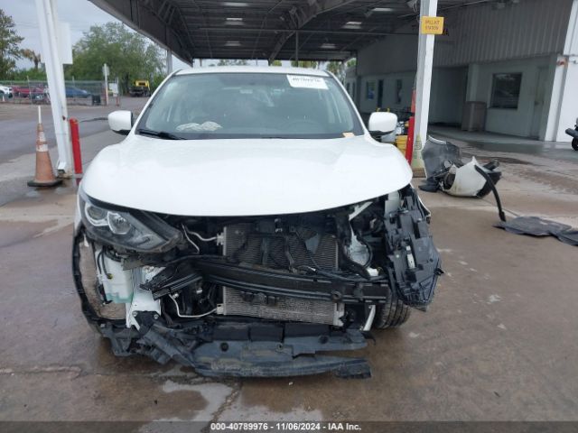 JN1BJ1CR9KW335590 Nissan Rogue Sport S