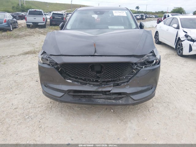2021 Mazda Cx-5 Grand Touring მანქანა იყიდება აუქციონზე, vin: JM3KFBDM0M1497154, აუქციონის ნომერი: 40790649