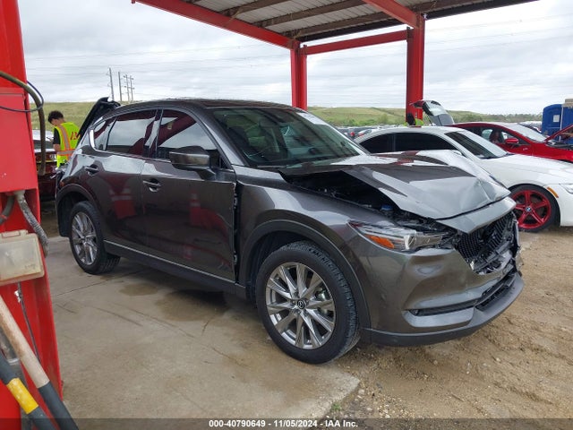 2021 Mazda Cx-5 Grand Touring მანქანა იყიდება აუქციონზე, vin: JM3KFBDM0M1497154, აუქციონის ნომერი: 40790649