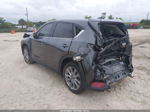 2021 Mazda Cx-5 Grand Touring მანქანა იყიდება აუქციონზე, vin: JM3KFBDM0M1497154, აუქციონის ნომერი: 40790649