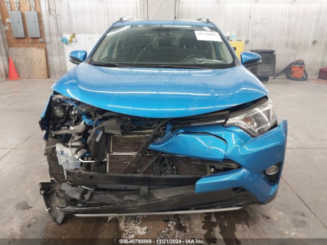 JTMRJREV0JD242956 Toyota Rav4 Hybrid Xle