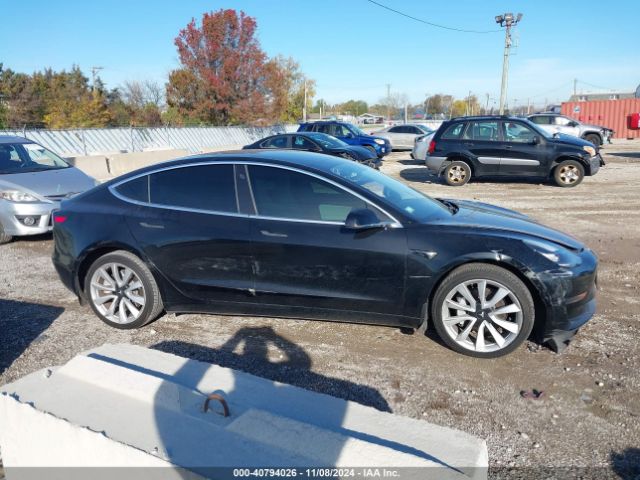 5YJ3E1EB3KF421889 Tesla 2019