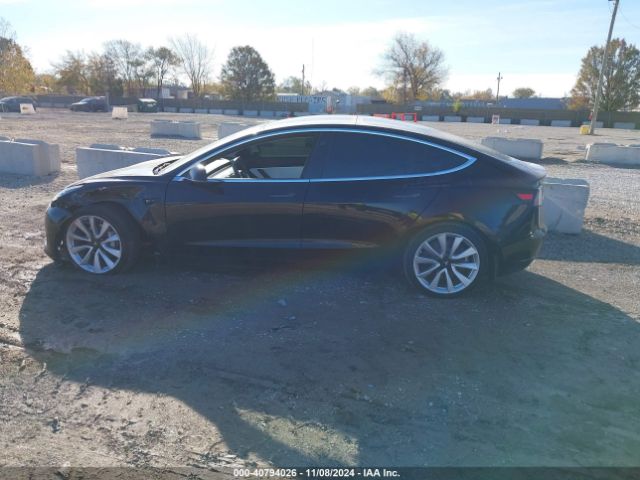 5YJ3E1EB3KF421889 Tesla 2019