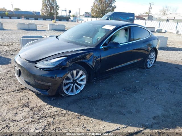 5YJ3E1EB3KF421889 Tesla 2019