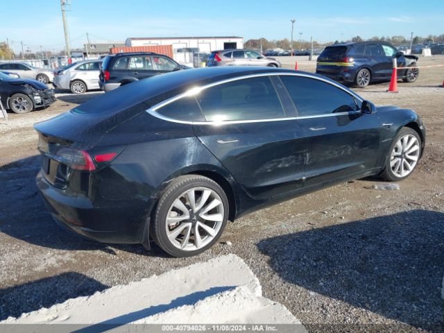 5YJ3E1EB3KF421889 Tesla 2019