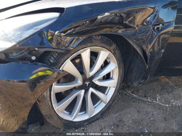 5YJ3E1EB3KF421889 Tesla 2019
