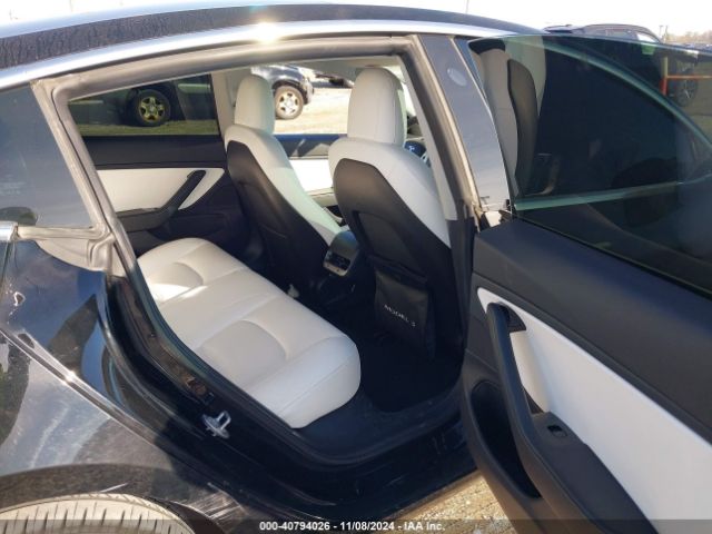 5YJ3E1EB3KF421889 Tesla 2019