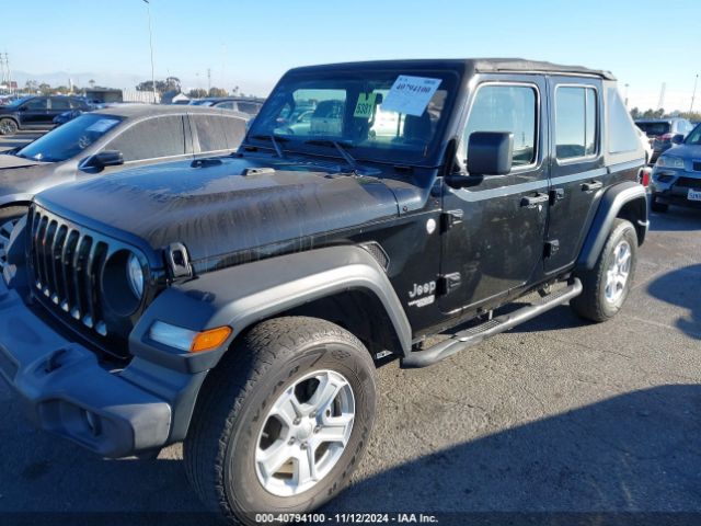 1C4HJXDG0JW151788 Jeep Wrangler Unlimited Sport 4x4