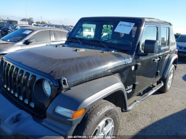 1C4HJXDG0JW151788 Jeep Wrangler Unlimited Sport 4x4