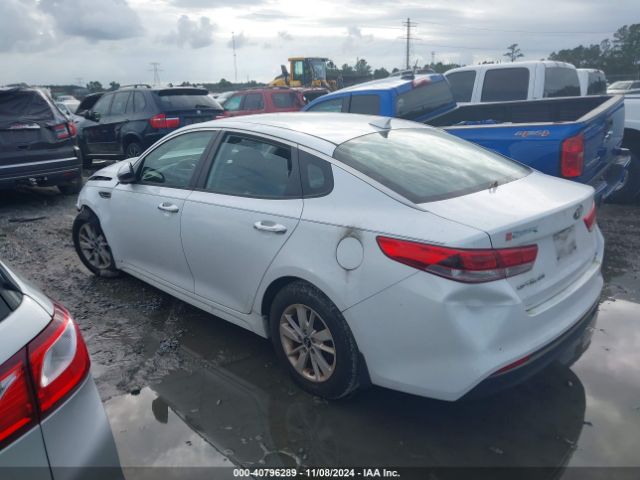 5XXGT4L35GG049304 KIA Optima Lx