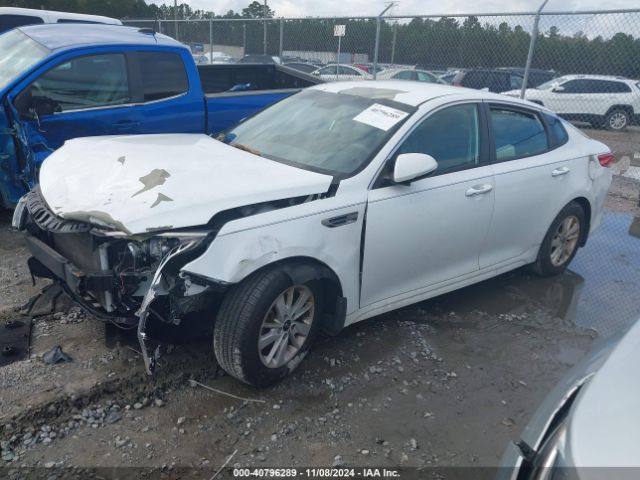 5XXGT4L35GG049304 KIA Optima Lx