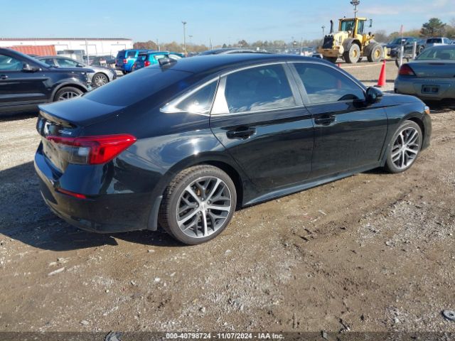 2HGFE1F94NH309594 Honda Civic Touring