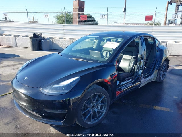 2023 TESLA MODEL 3 5YJ3E1EA7PF456899 Photo 1