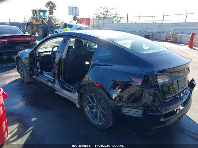2023 TESLA MODEL 3 5YJ3E1EA7PF456899 Photo 2