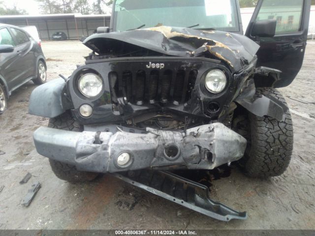 1C4BJWDG6GL148453 Jeep Wrangler Unlimited Sport