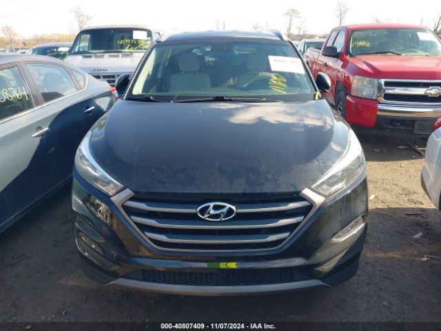 KM8J33A21GU212563 Hyundai Tucson Sport