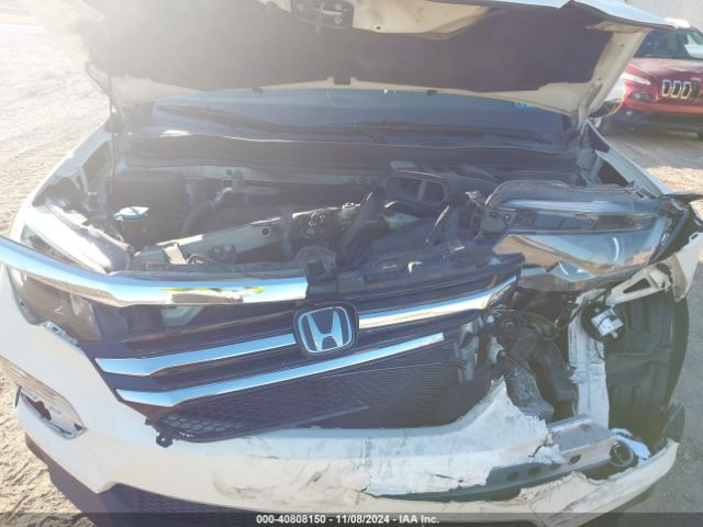 5FNYF6H04HB011153 Honda Pilot Elite