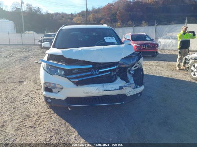 5FNYF6H04HB011153 Honda Pilot Elite