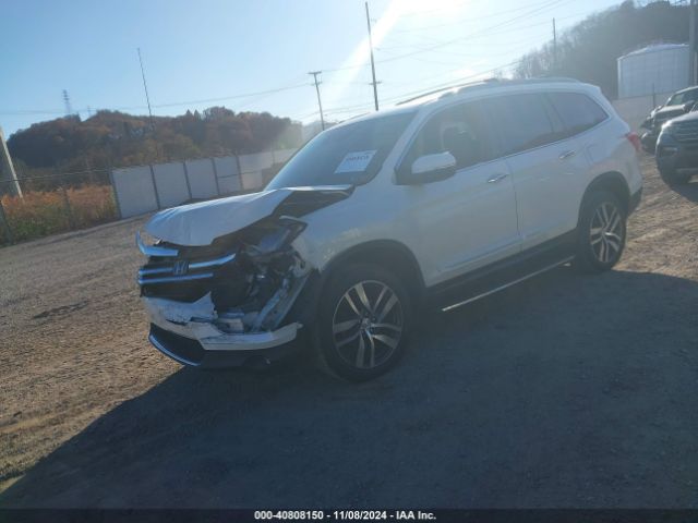 5FNYF6H04HB011153 Honda Pilot Elite