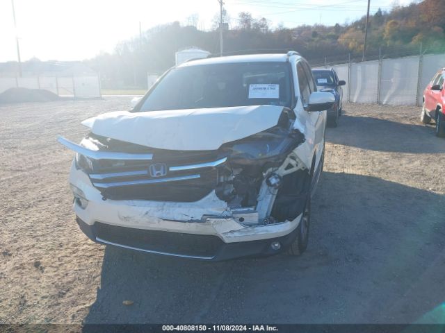 5FNYF6H04HB011153 Honda Pilot Elite
