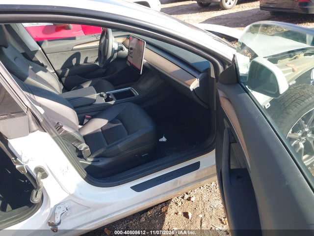2023 TESLA MODEL 3 5YJ3E1EAXPF611302 Photo 4