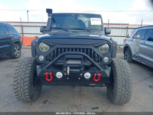 1C4BJWDG7GL265359 Jeep Wrangler Unlimited Sport