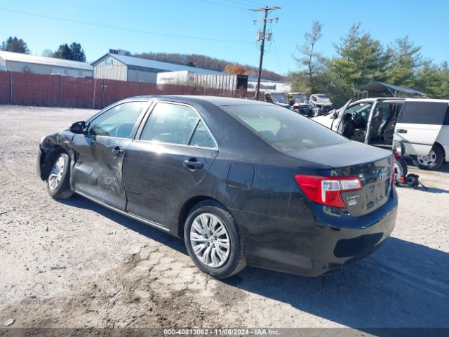 4T1BD1FK5EU104989 Toyota Camry Hybrid Le