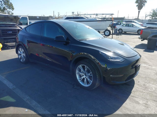2023 TESLA MODEL Y 7SAYGAEE8PF769580 Photo 0