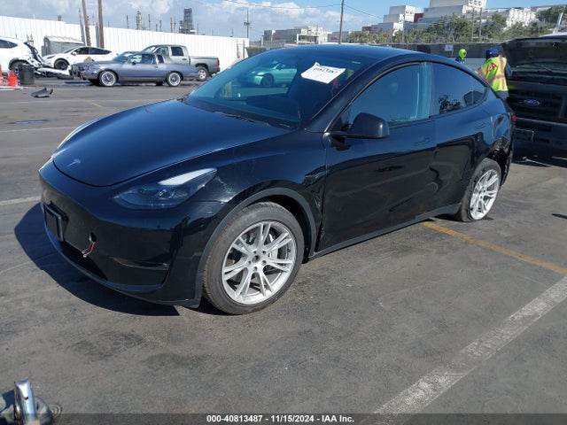 2023 TESLA MODEL Y 7SAYGAEE8PF769580 Photo 1