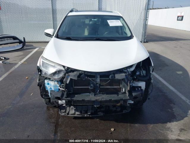 JTMRJREV2GD058062 Toyota Rav4 Hybrid Xle