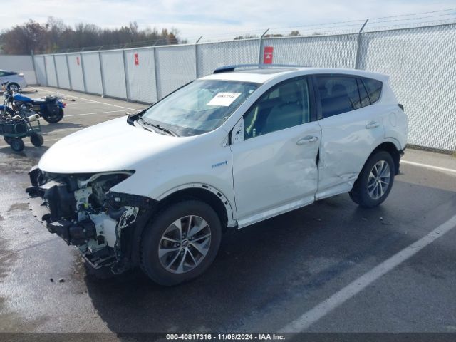 JTMRJREV2GD058062 Toyota Rav4 Hybrid Xle