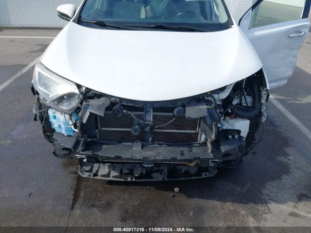 JTMRJREV2GD058062 Toyota Rav4 Hybrid Xle