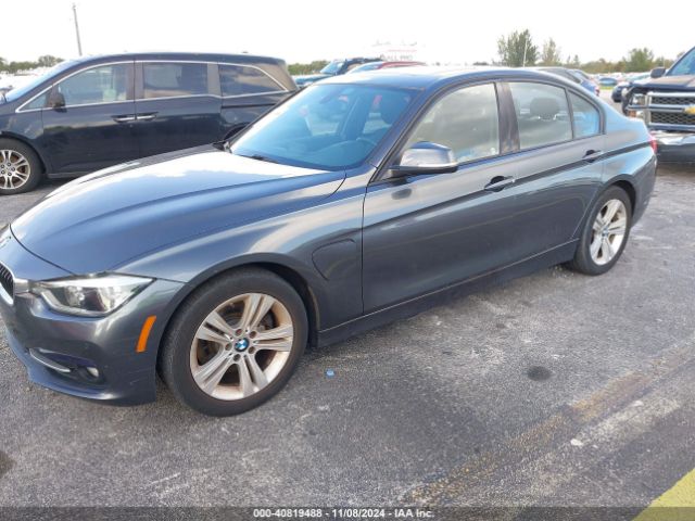 2016 BMW 330E WBA8E1C58GK479684 Photo 1