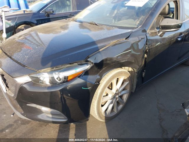 JM1BN1V79H1101453 Mazda Mazda3 Touring
