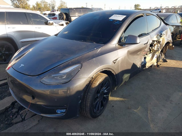 2021 TESLA MODEL Y 5YJYGDED2MF110296 Photo 1