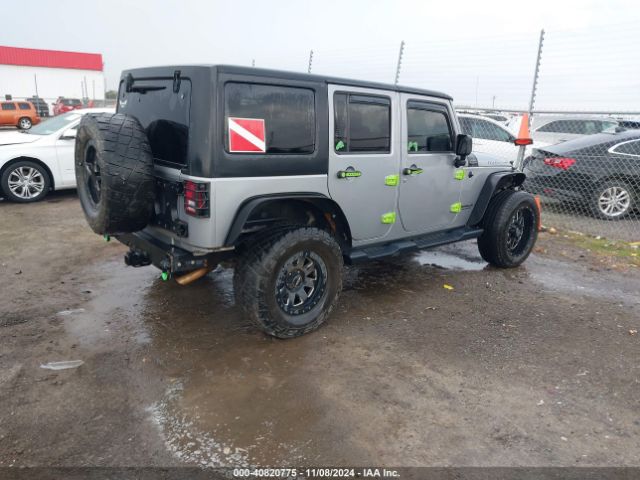 1C4BJWFGXGL105926 Jeep Wrangler Unlimited Rubicon
