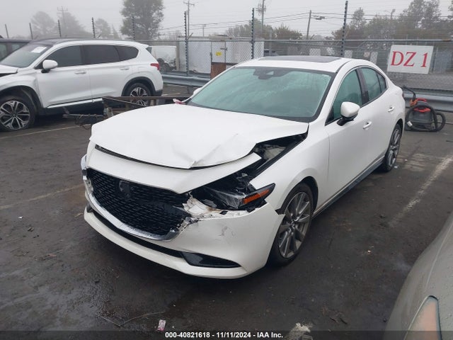 JM1BPAEM8L1169333 Mazda Mazda3 Premium Package