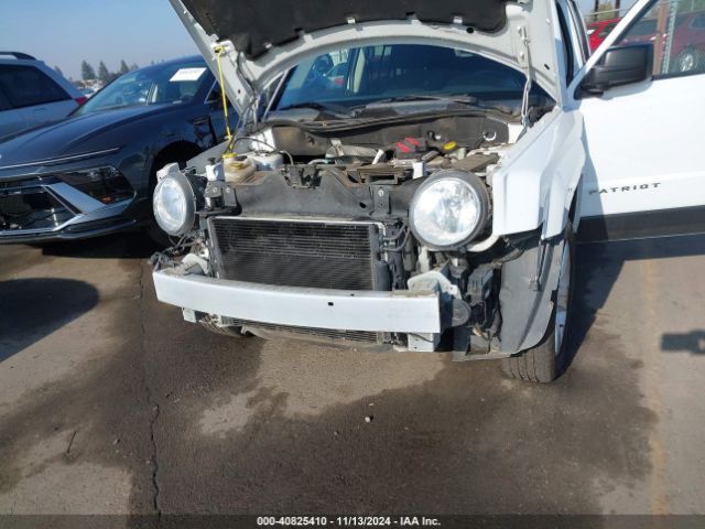1C4NJRFB2ED884233 Jeep Patriot Latitude