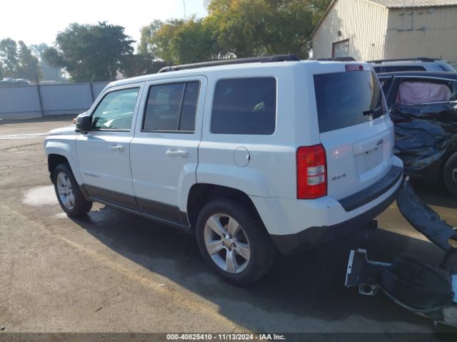 1C4NJRFB2ED884233 Jeep Patriot Latitude