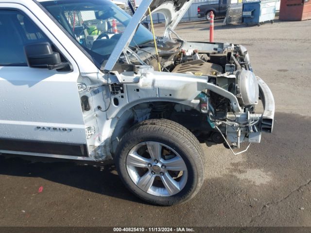 1C4NJRFB2ED884233 Jeep Patriot Latitude