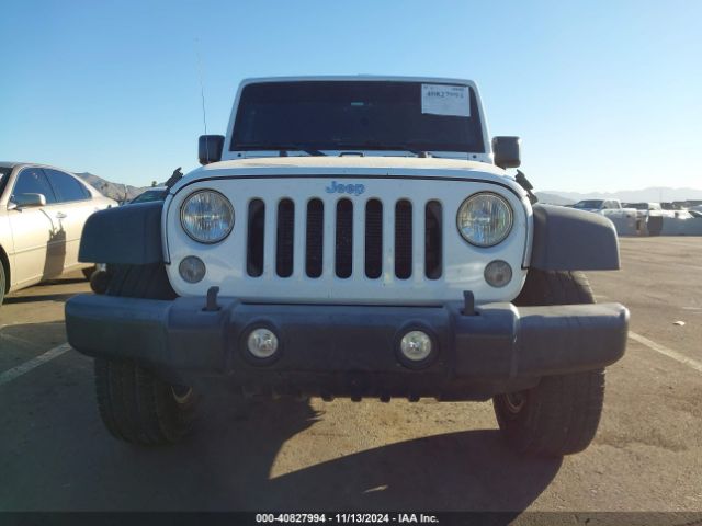 1C4BJWDG7GL232989 Jeep Wrangler Unlimited Sport