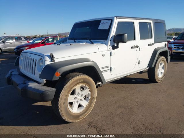 1C4BJWDG7GL232989 Jeep Wrangler Unlimited Sport